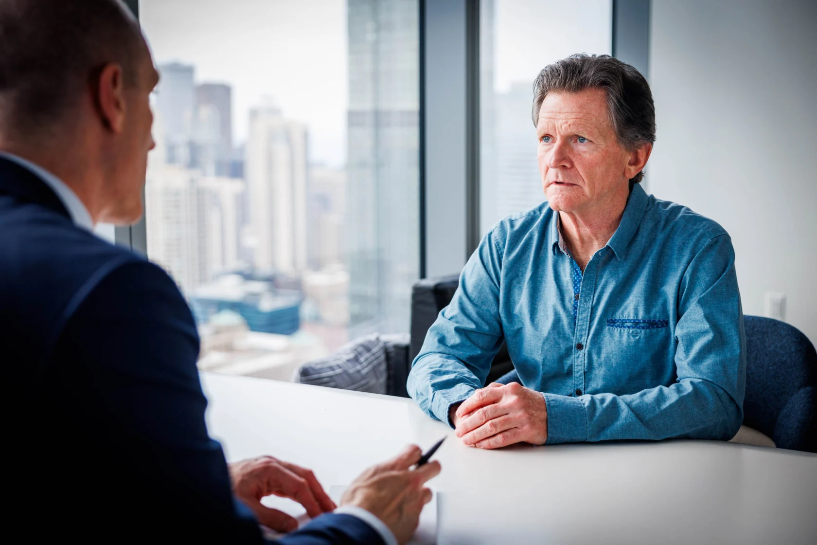 A client meeting with a lawyer.
