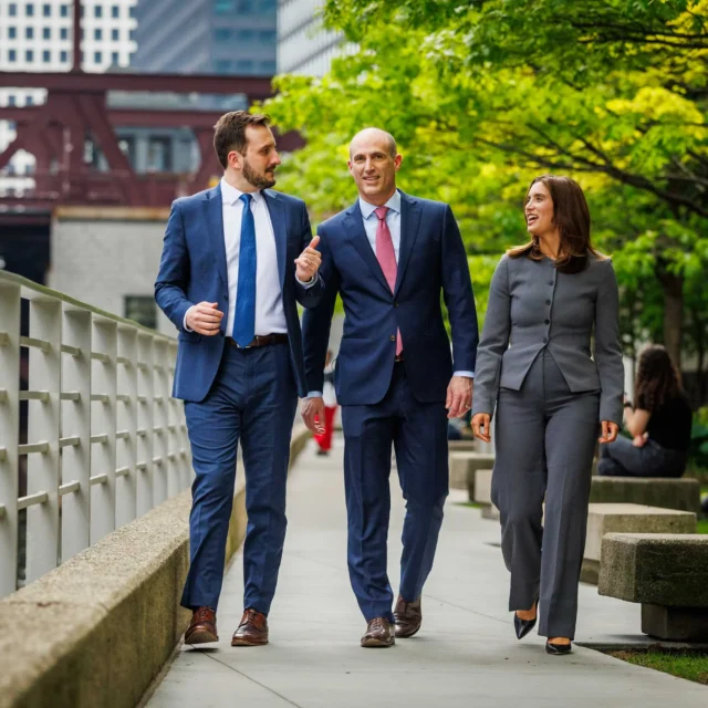 Three lawyers on a walk.